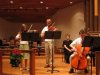 Harrison performing on viola
